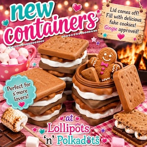 May include: A set of brown s'more-shaped containers with white marshmallow centers. One container is open, revealing a gingerbread man figure inside. The image includes text: new containers, Lid comes off! Fill with delicious fake cookies! Gingie approved!, Perfect for s'more lovers!, at Lollipots 'n' Polkadots.