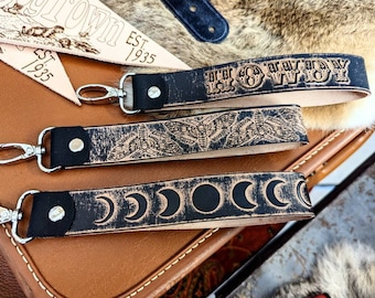 HOWDY, Moth, Moon Phases, Wristlet Strap, Embossed Leather Key Chain Clip, Holds 3+ Key Rings, Clip your keys to almost anything!