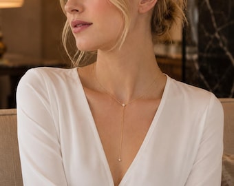 Collana a Y color oro, pendente a lariat delicato, dettagli trasparenti, gioiello minimalista a catena