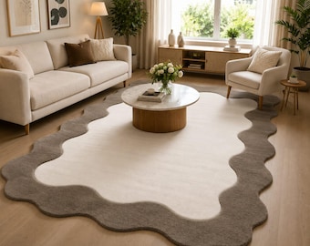Alfombra abstracta bicolor orgánica moderna para elegantes espacios de sala de estar contemporáneos.