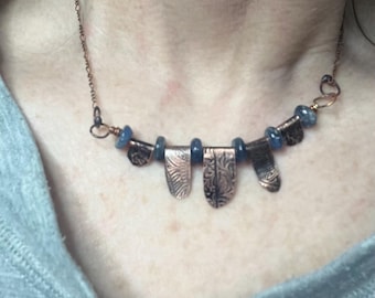 Artisan, handmade, necklace, OOAK, in copper,and kyanite,denim matching  blue stone beads and embossed copper flaps on a copper chain, 16”