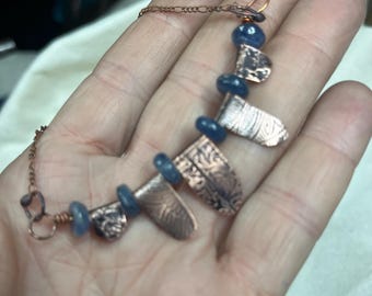Artisan, handmade, necklace, OOAK, in copper,and kyanite,denim matching  blue stone beads and embossed copper flaps on a copper chain, 16”