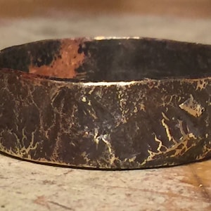 Textured ring, of sterling silver over copper,reticulated silver, one of a kind,  made to order