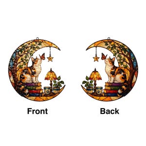 May include: Two circular stained glass suncatchers featuring a calico cat sitting on a stack of books under a crescent moon. The design includes a tree, a butterfly, a lamp, a potted plant, and a mug. The text Front and Back is below each.