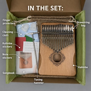 May include: A wooden kalimba set in a cardboard box labeled IN THE SET. Includes a kalimba with metal tines, a silver tuning hammer, a brown drawstring bag, two white finger protectors, a cleaning cloth, note stickers, and a songbook.