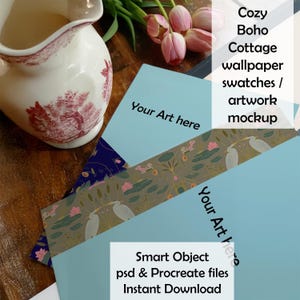 May include: A mockup featuring wallpaper swatches, a blue card with "Your Art here" text, and a white and red floral pitcher. The image includes text that reads "Cozy Boho Cottage wallpaper swatches / artwork mockup" and "Smart Object psd & Procreate files Instant Download."