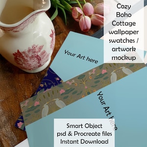 May include: A digital mockup set featuring light blue rectangular swatches with the text 'Your Art here'. One swatch displays a pattern of white herons, pink lotus flowers, and green lily pads. Includes text 'Cozy Boho Cottage wallpaper swatches / artwork mockup' and 'Smart Object psd & Procreate files Instant Download'.