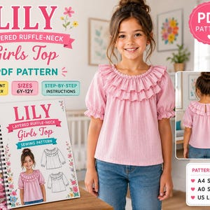 May include: A digital sewing pattern for a Lily layered ruffle-neck top. The product includes instructions for sizes 6Y-12Y, featuring a pink top with short puff sleeves and a double-layered ruffled collar, shown on a model and in a spiral-bound book.