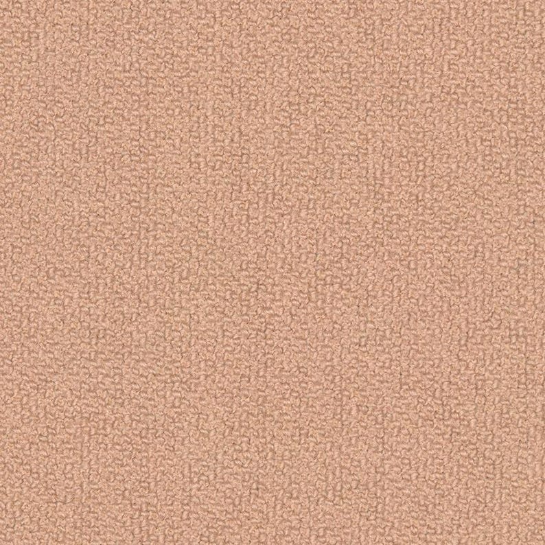 May include: A close-up of a textured, peach-colored fabric. The surface has a dense, irregular pattern, creating a soft, tactile appearance. The color is a warm, neutral tone, suitable for various applications.