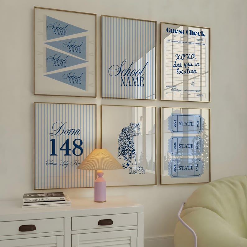May include: A gallery wall set of six framed prints featuring blue and white designs, including pennants, striped patterns, a guest check with text, a dorm room sign, a leopard illustration, and three tickets labeled STATE 2026.