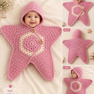 May include: A star-shaped crochet baby swaddle blanket with a hood in pink and cream. The garment features a central cream-colored circular pattern, two wooden buttons for closure, and a star-shaped silhouette. The text reads Size 0 to 3 months.