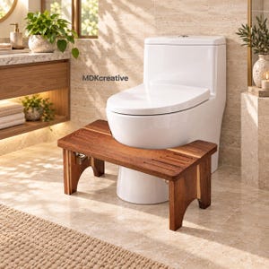 May include: A rectangular wooden bathroom stool with a dark brown finish and slatted top surface, positioned directly in front of a white ceramic toilet. The stool features arched side supports and a sturdy construction, with the text MDKcreative visible.
