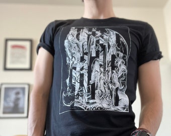 May include: A black t-shirt with a white graphic print of a stylized image with the text "The Devil's Advocate".