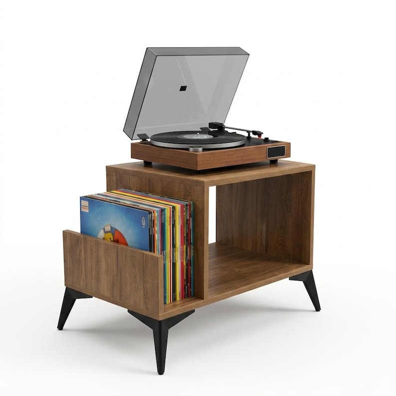 May include: A wooden record player stand with a walnut finish and black angled legs. The stand features a side compartment filled with vinyl records and a top surface holding a black turntable with a clear dust cover and silver accents.