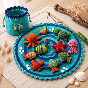 May include: A crochet fishing game set featuring a circular blue water-themed mat, a drawstring storage bag, and a wooden fishing rod. The set includes various stuffed crochet sea creatures like an octopus, turtle, starfish, crab, and fish.