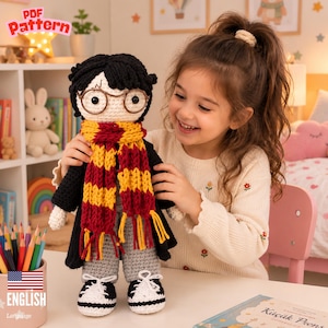 May include: A handmade crochet doll featuring black yarn hair, round wire-rimmed glasses, and a lightning bolt scar on the forehead. The doll wears a black coat, grey trousers, black and white trainers, and a thick yellow and red striped scarf.