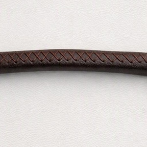 May include: A horse bit featuring two large, circular stainless steel rings connected by a central, slightly curved mouthpiece covered in dark brown leather with a visible, intricate cross-stitched pattern along its entire length.