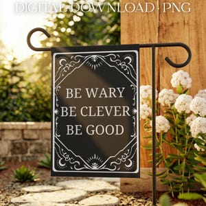 May include: A rectangular black garden flag featuring a white decorative border with celestial motifs and the text "BE WARY BE CLEVER BE GOOD" in a serif font. The flag is suspended from a black metal stand, displaying a digital design.