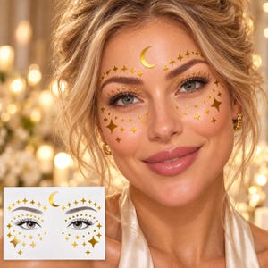 May include: A set of gold metallic temporary face tattoos featuring a crescent moon, various sizes of four-pointed stars, and small circular dots. The design is arranged to be applied around the eyes and on the forehead as decorative facial art.