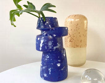 A-symmetrical vase cobalt blue matte glaze with white glossy spatters