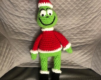 Ladrón de Navidad travieso verde