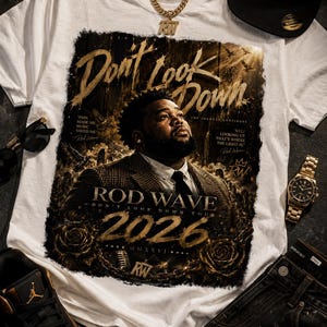 May include: A white t-shirt featuring a graphic print of Rod Wave with the text Don't Look Down, Rod Wave, Don't Look Down Tour, 2026, MMXXVI, and RW. The design includes gold-toned accents, roses, and city imagery, surrounded by a black cap, gold chain, watch, sunglasses, sneakers, and jeans.