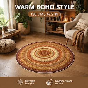 May include: A circular area rug featuring a detailed mandala pattern in shades of orange, brown, and cream. The rug measures 120 cm in diameter and is made of polyester with a low-pile, machine-woven texture for a flat, consistent surface.
