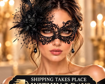 May include: A black lace masquerade mask featuring intricate filigree patterns, adorned with a large black fabric flower, dark feathers, and fine netting. The mask is paired with dangling black teardrop earrings.