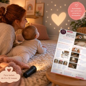 Peut inclure: Un guide pédagogique imprimé intitulé Seguimiento de Luz Sutil avec du texte et des photos d'activités pour bébé, présenté sur un support en bois à côté d'une lampe torche noire projetant une lumière en forme de cœur sur un mur.