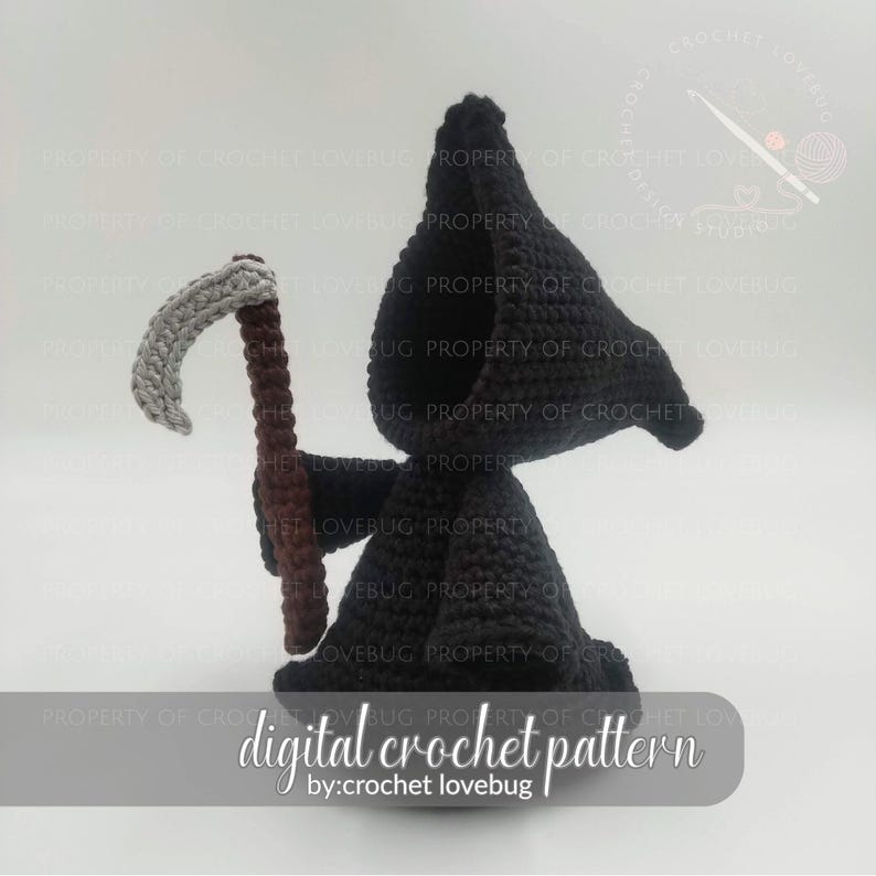 May include: A crocheted figure of the Grim Reaper, in black, holding a scythe. The scythe has a gray blade and a brown handle. The figure is wearing a hooded cloak. The text "digital crochet pattern by: crochet lovebug" is at the bottom.