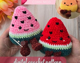 May include: Two plush crochet watermelon toys with smiling faces, black heart-shaped seeds, and brown legs. One is pink and the other is red. A circular inset shows a yellow, orange, and white candy corn plush. Text reads: INCLUDES CANDY CORN MOD.