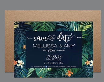 May include: Save the date card with a tropical leaf background. The card is navy blue with white text that says "save the date" with a heart symbol, "Melissa & Amy are getting married", "17.03.18", "Mauritius", and "formal invitation to follow".