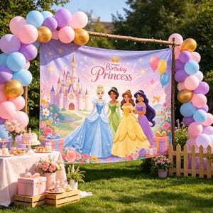 May include: A rectangular backdrop featuring a castle and four princesses with the text Happy Birthday Princess, framed by a balloon arch in shades of pink, blue, purple, and gold, set outdoors with a table displaying gifts and flowers.
