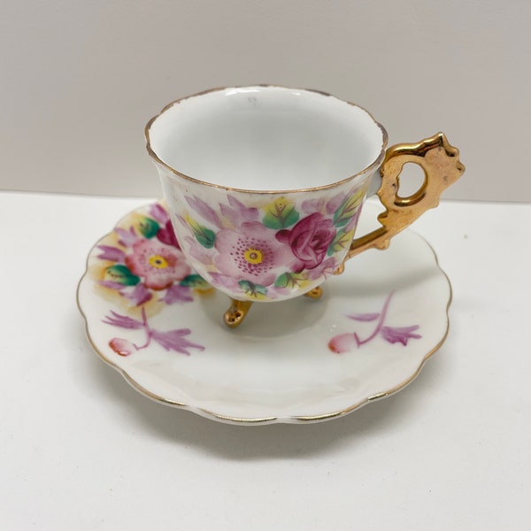 Vintage small dainty teacup and saucer floral and gold pattern footed cup occupied Japan