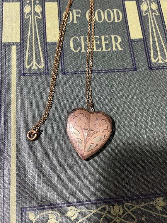 Gold heart shaped Locket marked 14kt GF