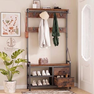 May include: A tall hall tree featuring a dark brown wood-grain finish and a black metal frame. It includes a top shelf, a row of hooks for hanging items, a central bench, two lower shoe storage shelves, and two drawers with black metal handles.