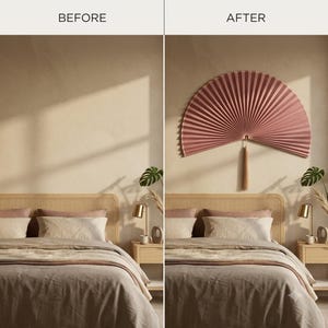 Close-up product view of a dusty rose bamboo wall fan with tassel, showing the woven surface, bamboo ribs, edge details and decorative finish.