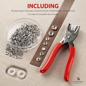 May include: A metal snap fastener kit including a pair of red-handled pliers, a clear dish filled with silver-colored metal snap components, and two white plastic rings. Text reads: INCLUDING 50 pieces open-ring caps, 25 pieces of each socket/female, and stud/male for make 25 complete sets of snaps.