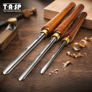 May include: Three woodturning gouges with polished metal blades and dark brown wooden handles. Each tool features a brass ferrule connecting the blade to the handle. The metal blades are engraved with the T.A.SP brand name and size markings.