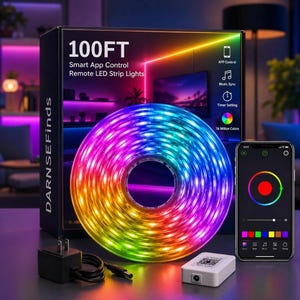 May include: A 100FT smart LED strip light kit featuring a coiled multi-colored light strip, a black power adapter, a white control box, and a smartphone displaying a color wheel app interface. The packaging box shows the text 100FT Smart App Control.