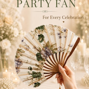 May include: A folding hand fan with a cream-coloured fabric leaf featuring a green and purple floral print. The fan has dark brown wooden ribs and a small matching tassel hanging from the handle. The text PARTY FAN For Every Celebration is visible.