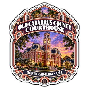 May include: A decorative sticker featuring the Old Cabarrus County Courthouse in North Carolina, USA. The image shows a red brick building with a clock tower under a sunset sky, framed by ornate borders with text at the top and bottom.