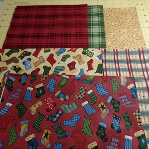 Retired Christmas fabric &quot;Peace on Earth&quot; by Teresa Kogut and &quot;Happy Holidays&quot; by Nancy Halvorsen