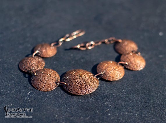 Hand hammered copper dome bracelet finished with a beautiful ancient copper patina
