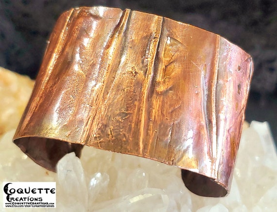 Hand hammered and fold formed copper cuff bracelet finished with a beautiful rustic patina.