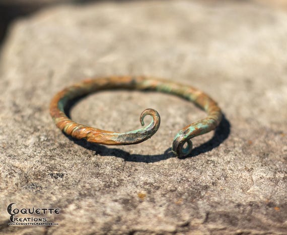 Hand hammered copper torc bracelet finished with a beautiful ancient patina