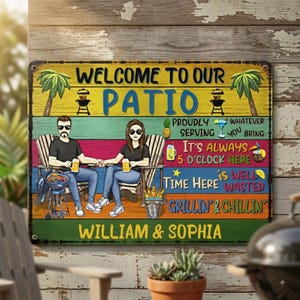 May include: A rectangular metal sign with a colorful striped background featuring illustrations of two people sitting in chairs, a grill, palm trees, and drinks. The text reads: WELCOME TO OUR PATIO, PROUDLY SERVING WHATEVER YOU BRING, IT'S ALWAYS 5 O'CLOCK HERE, TIME HERE IS WELL WASTED, GRILLIN' & CHILLIN', WILLIAM & SOPHIA.