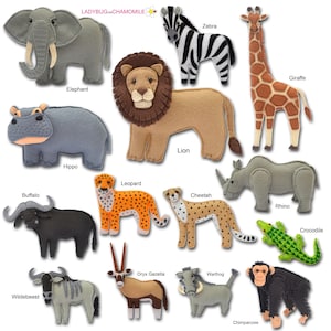 May include: A collection of felt animal figures including an elephant, zebra, giraffe, lion, hippo, leopard, cheetah, rhino, crocodile, buffalo, wildebeest, oryx gazella, warthog, and chimpanzee, labeled with text by LADYBUGONCHAMOMILE.