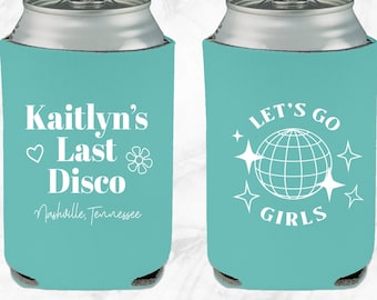 May include: Two turquoise blue can coolers with white text and graphics. The first cooler says "Kaitlyn's Last Disco Nashville, Tennessee". The second cooler says "Let's Go Girls" with a disco ball graphic.