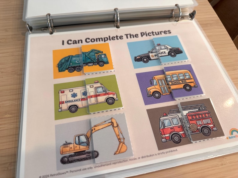 May include: A binder page titled I Can Complete The Pictures featuring six matching activities with illustrations of a garbage truck, police car, ambulance, school bus, and excavator. Each vehicle is split into two parts for a puzzle game.